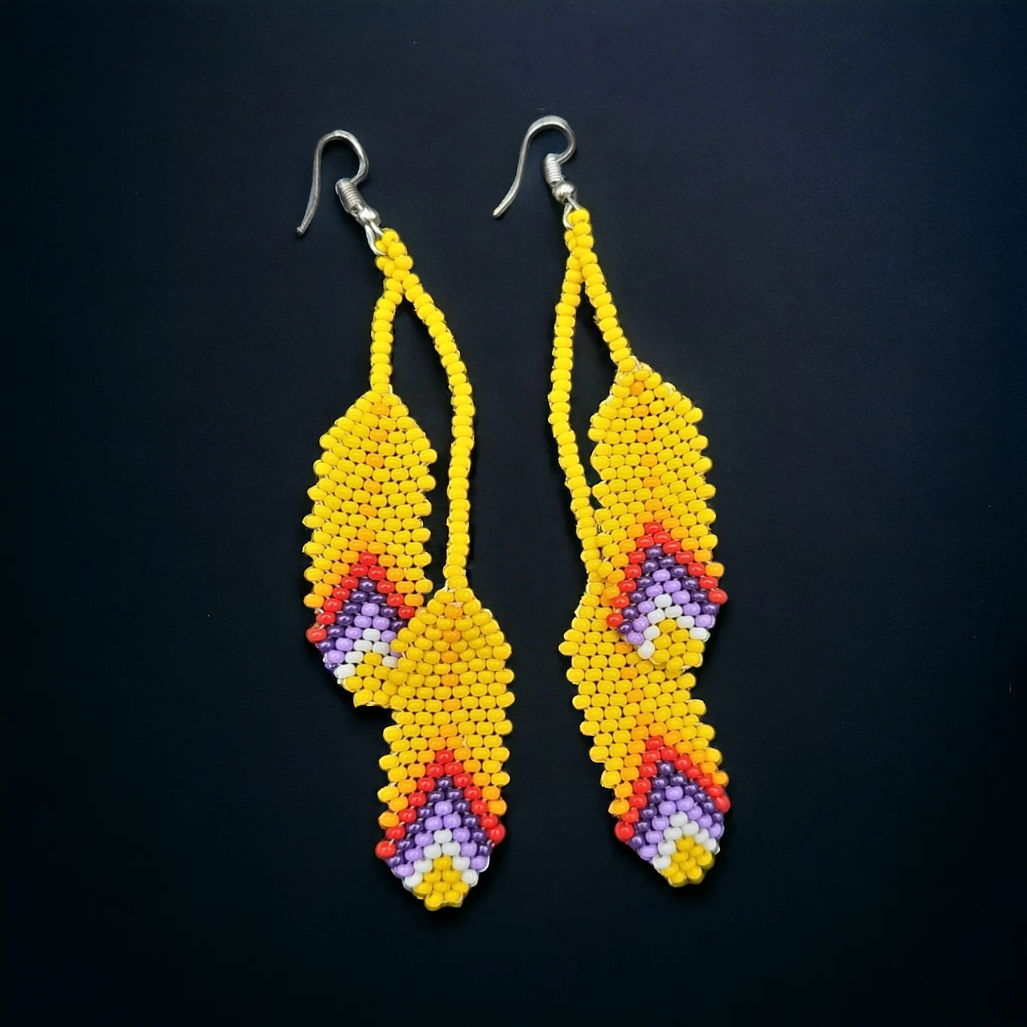 OldTribes™ yellow beaded Feather earrings